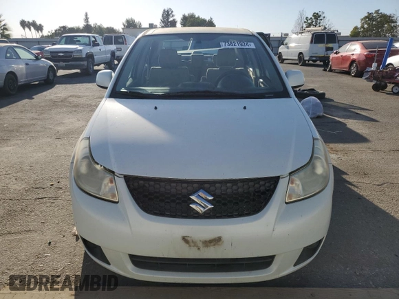 2009 Suzuki SX4 Man FWD with VIN JS2YC412796200908, listed as a Copart auction lot 73821924 with 125,721 mi miles and Salvage Title. Bid and sale history available at carsss.com. Image 5.