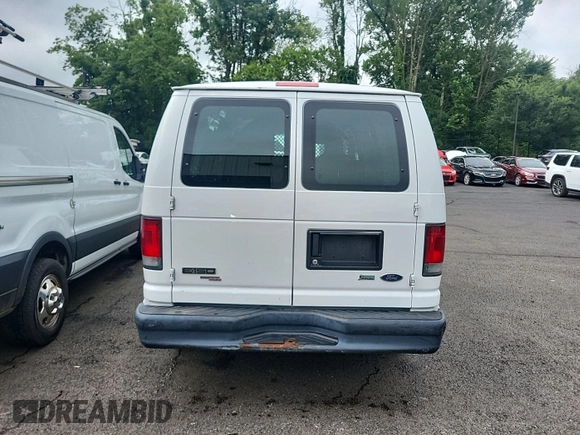 2013 Ford Econoline Cargo Commercial with VIN 1FTNE1EW3DDA61111, listed as a IAAI auction lot 42786321 with 199,373 mi miles and . Bid and sale history available at DreamBid. Image 13.