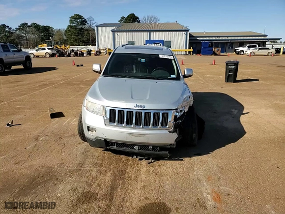 2011 Jeep Grand Cherokee Laredo with VIN 1J4RR4GTXBC679503, listed as a Copart auction lot 41815545 with 167,313 mi miles and Salvage Title. Bid and sale history available at carsss.com. Image 12.