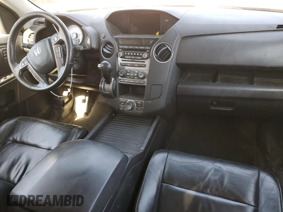 2012 Honda Pilot Touring with VIN 5FNYF4H9XCB084796, listed as a Copart auction lot 49319735 with 184,639 mi miles and Salvage Title. Bid and sale history available at DreamBid. Image 8.