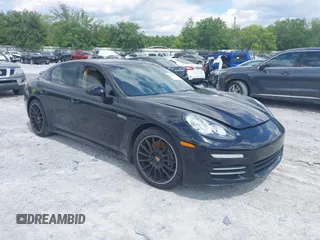 2016 Porsche Panamera 4 z VIN WP0AA2A71GL001210, wystawiony jako IAAI lot #42230574 z przebiegiem Nie podano mil oraz . Historia ofert i sprzedaży dostępna na DreamBid. Obrazek 1.