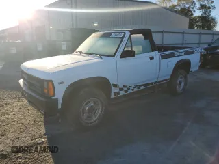 1989 Dodge Dakota z VIN 1B7GG69X7KS181375, wystawiony jako Copart lot #75844234 z przebiegiem 97 842 mil mil oraz Szkoda całkowita • Salvage title. Historia ofert i sprzedaży dostępna na DreamBid. Obrazek 1.