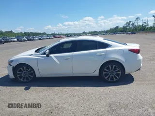 2016 Mazda Mazda6 i Grand Touring with VIN JM1GJ1W55G1443186, listed as a IAAI auction lot 42063716 with 114,263 mi miles. Bid and sale history available at carsss.com. Image 14.