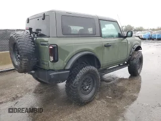 2021 Ford Bronco with VIN 1FMDE5AH7MLA79865, listed as a Copart auction lot 46552595 with 33,636 mi miles and Salvage Title. Bid and sale history available at carsss.com. Image 3.