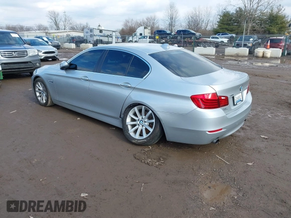 2014 BMW 5 Series 535i xDrive with VIN WBA5B3C52ED537121, listed as a IAAI auction lot 41678763 with 126,979 mi miles and . Bid and sale history available at carsss.com. Image 3.