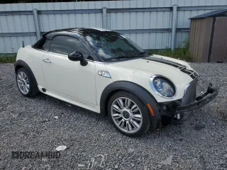 2012 MINI Coupe S z VIN WMWSX3C56CT154872, wystawiony jako Copart lot #68011264 z przebiegiem 91 650 mil mil oraz Szkody całkowita. Historia ofert i sprzedaży dostępna na DreamBid. Obrazek 4.