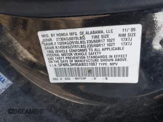 2010 Honda Odyssey Touring with VIN 5FNRL3H95AB031007, listed as a IAAI auction lot 41852435 with 207,919 mi miles. Bid and sale history available at carsss.com. Image 9.