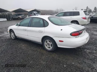 1999 Ford Taurus SE z VIN 1FAFP53U5XA269767, wystawiony jako IAAI lot #41504302 z przebiegiem 182 198 mil mil oraz . Historia ofert i sprzedaży dostępna na DreamBid. Obrazek 3.