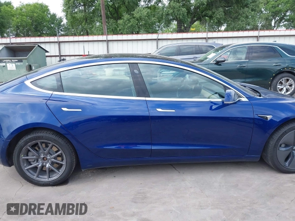 2019 Tesla Model 3 Mid Range with VIN 5YJ3E1EA5KF190453, listed as a IAAI auction lot 41880684 with 58,909 mi miles and . Bid and sale history available at carsss.com. Image 14.