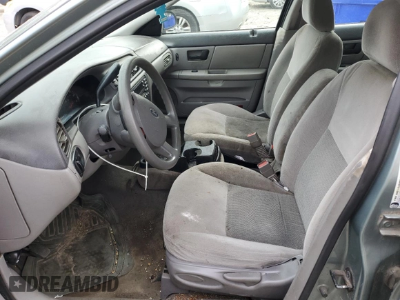 2007 Ford Taurus SE with VIN 1FAFP53U07A101535, listed as a Copart auction lot 56385185 with Not provided miles and Salvage title. Bid and sale history available at DreamBid. Image 7.