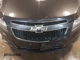 2014 Chevrolet Cruze 1LT with VIN 1G1PC5SBXE7477219, listed as a IAAI auction lot 41970786 with 194,542 mi miles and . Bid and sale history available at DreamBid. Image 6.