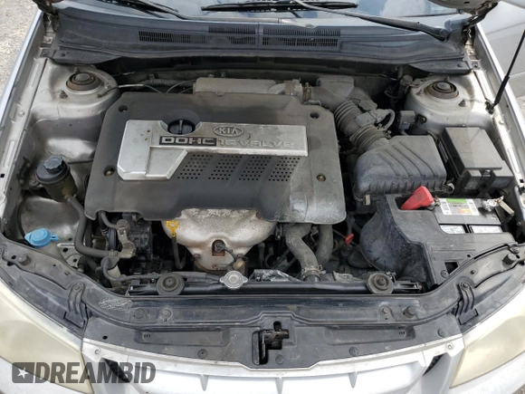 2004 Kia Spectra LX with VIN KNAFE121245031019, listed as a Copart auction lot 52960135 with 183,016 mi miles and Salvage Title. Bid and sale history available at carsss.com. Image 11.