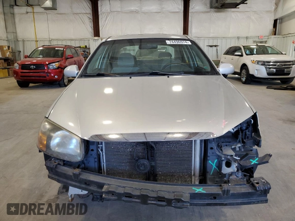 2009 Kia Spectra EX with VIN KNAFE221X95650545, listed as a Copart auction lot 74496974 with 203,752 mi miles and Non Repairable. Bid and sale history available at carsss.com. Image 5.