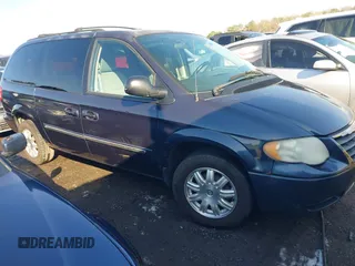 2007 Chrysler Town & Country LWB Touring with VIN 2A4GP54L97R310749, listed as a IAAI auction lot 41709804 with 1 mi miles. Bid and sale history available at carsss.com. Image 1.