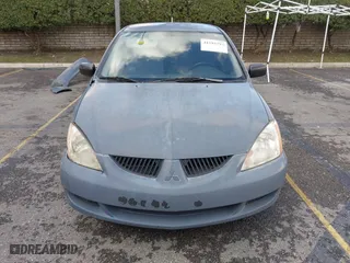 2004 Mitsubishi Lancer ES with VIN JA3AJ26E54U054570, listed as a IAAI auction lot 41592397 with 220,140 mi miles. Bid and sale history available at carsss.com. Image 12.