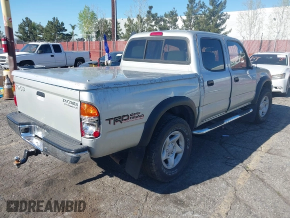 2001 Toyota Tacoma PreRunner z VIN 5TEGN92N51Z804874, wystawiony jako IAAI lot #41861876 z przebiegiem 201 333 mil mil oraz . Historia ofert i sprzedaży dostępna na DreamBid. Obrazek 4.