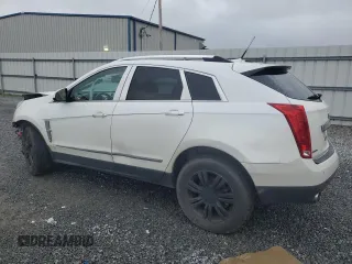 2012 Cadillac SRX Luxury Collection z VIN 3GYFNAE32CS591556, wystawiony jako Copart lot #50870825 z przebiegiem 157 414 mil mil oraz Szkody całkowita. Historia ofert i sprzedaży dostępna na DreamBid. Obrazek 2.