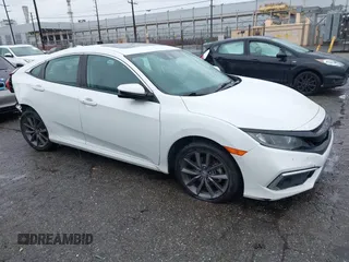 2021 Honda Civic Sedan EX-L with VIN 19XFC1F77ME205128, listed as a IAAI auction lot 41562202 with 82,257 mi miles. Bid and sale history available at carsss.com. Image 1.
