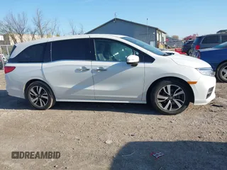 2020 Honda Odyssey Elite with VIN 5FNRL6H92LB014671, listed as a IAAI auction lot 42110389 with 104,180 mi miles and . Bid and sale history available at DreamBid. Image 13.