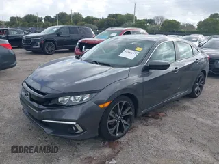 2019 Honda Civic Sport with VIN 2HGFC2F89KH563333, listed as a IAAI auction lot 41959217 with 66,068 mi miles and . Bid and sale history available at DreamBid. Image 17.