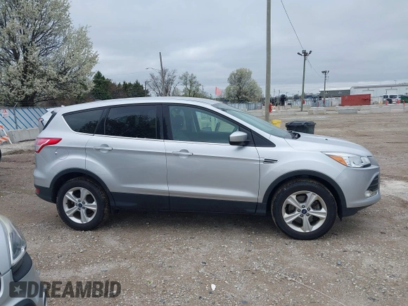 2016 Ford Escape SE with VIN 1FMCU9GX3GUA96262, listed as a IAAI auction lot 41915524 with 64,434 mi miles and . Bid and sale history available at DreamBid. Image 13.