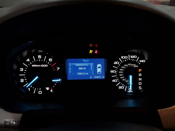 2014 Ford Edge SEL z VIN 2FMDK4JC2EBA50332, wystawiony jako Copart lot #87367284 z przebiegiem 164 873 mil mil oraz Szkoda całkowita • Salvage title. Historia ofert i sprzedaży dostępna na DreamBid. Obrazek 9.