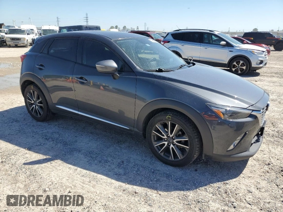 2016 Mazda CX-3 Grand Touring with VIN JM1DKBD7XG0109347, listed as a Copart auction lot 48655745 with 103,674 mi miles and Salvage Title. Bid and sale history available at carsss.com. Image 4.