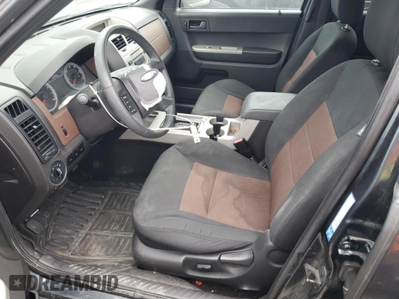 2008 Ford Escape XLT with VIN 1FMCU03198KA67732, listed as a Copart auction lot 56878455 with 105,619 mi miles and Salvage title. Bid and sale history available at DreamBid. Image 7.
