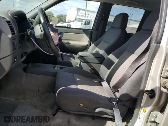 2005 GMC Canyon 1SB SLE Z85 with VIN 1GTCS138658111627, listed as a Copart auction lot 80232384 with 143,775 mi miles and Salvage title. Bid and sale history available at DreamBid. Image 7.