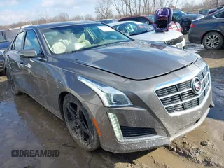 2014 Cadillac CTS Luxury AWD with VIN 1G6AX5SX3E0170709, listed as a IAAI auction lot 41646050 with 55,216 mi miles and . Bid and sale history available at carsss.com. Image 1.