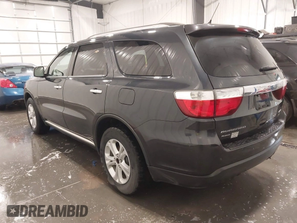 2013 Dodge Durango Crew with VIN 1C4RDJDGXDC691311, listed as a IAAI auction lot 41642267 with 167,098 mi miles and . Bid and sale history available at DreamBid. Image 3.
