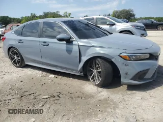 2022 Honda Civic Sedan Touring with VIN 2HGFE1F94NH302242, listed as a Copart auction lot 51201855 with 55,904 mi miles and Non Repairable. Bid and sale history available at carsss.com. Image 4.