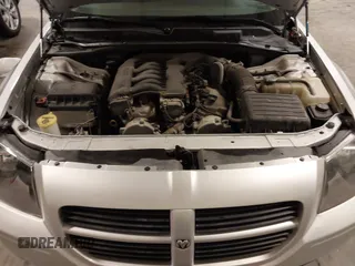 2005 Dodge Magnum z VIN 2DRGZR8V15H587486, wystawiony jako IAAI lot #42040578 z przebiegiem 179 158 mil mil oraz . Historia ofert i sprzedaży dostępna na DreamBid. Obrazek 10.