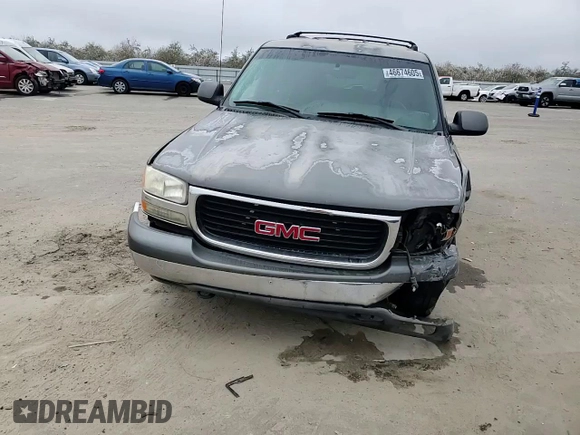 2002 GMC Yukon SLE z VIN 1GKEC13V52J192656, wystawiony jako Copart lot #46674605 z przebiegiem 258 336 mil mil oraz Szkoda całkowita • Salvage title. Historia ofert i sprzedaży dostępna na DreamBid. Obrazek 12.