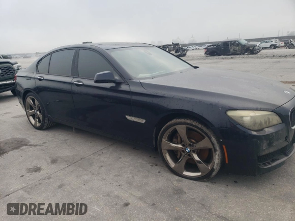 2011 BMW 7 Series 750i with VIN WBAKA8C5XBCY37073, listed as a Copart auction lot 76238914 with 129,493 mi miles and Clean title. Bid and sale history available at DreamBid. Image 4.