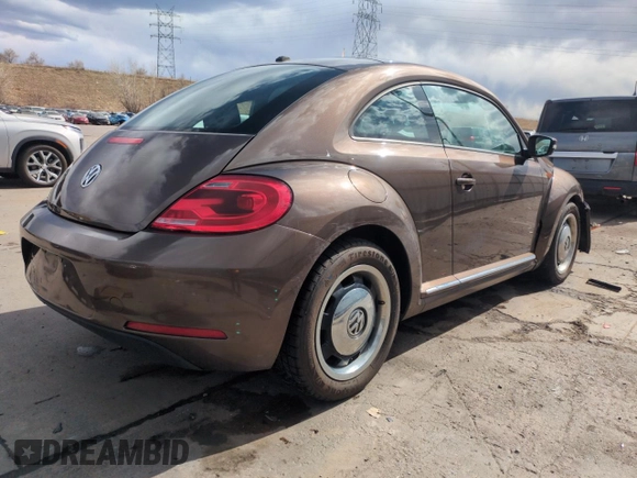 2013 Volkswagen Beetle with VIN 3VWHX7AT8DM603424, listed as a Copart auction lot 51019185 with 136,196 mi miles and Salvage Title. Bid and sale history available at DreamBid. Image 3.