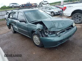 1996 Subaru Legacy L z VIN 4S3BK4356T7320808, wystawiony jako IAAI lot #42308582 z przebiegiem 140 613 mil mil oraz . Historia ofert i sprzedaży dostępna na DreamBid. Obrazek 1.