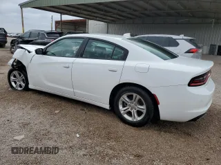 2023 Dodge Charger SXT with VIN 2C3CDXBG3PH563638, listed as a Copart auction lot 52864805 with 55,556 mi miles and Non Repairable. Bid and sale history available at DreamBid. Image 2.