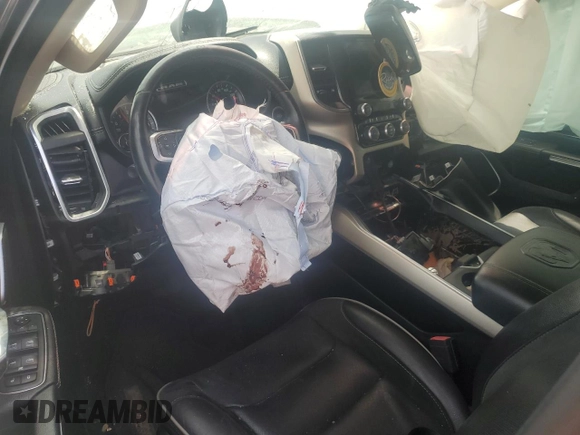 2019 Ram 1500 Laramie z VIN 1C6SRFJT8KN809379, wystawiony jako Copart lot #52827415 z przebiegiem Nie podano mil oraz Czysty tytuł • Clean title. Historia ofert i sprzedaży dostępna na DreamBid. Obrazek 8.