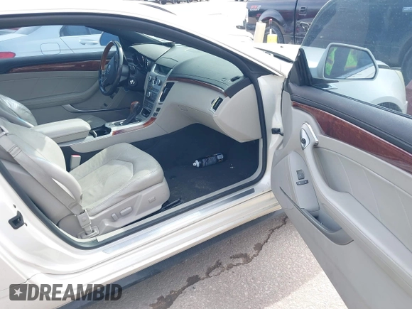 2011 Cadillac CTS Performance with VIN 1G6DJ1ED3B0142767, listed as a IAAI auction lot 41676404 with 238,027 mi miles and . Bid and sale history available at DreamBid. Image 5.