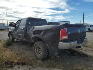 2015 Ram 3500 Laramie with VIN 3C63RRJL6FG688274, listed as a Copart auction lot 71990594 with 157,809 mi miles and Salvage Title. Bid and sale history available at carsss.com. Image 2.