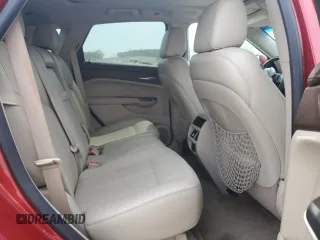2012 Cadillac SRX Luxury Collection z VIN 3GYFNAE33CS541684, wystawiony jako Copart lot #57157985 z przebiegiem 158 068 mil mil oraz Szkoda całkowita • Salvage title. Historia ofert i sprzedaży dostępna na DreamBid. Obrazek 11.