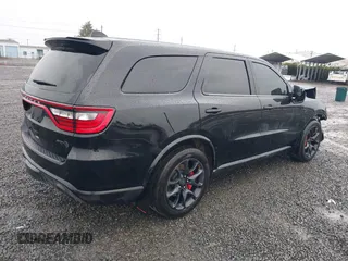 2021 Dodge Durango SRT Hellcat with VIN 1C4SDJH95MC643177, listed as a IAAI auction lot 41007139 with 31,650 mi miles and . Bid and sale history available at DreamBid. Image 4.