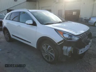 2019 Kia Niro Touring with VIN KNDCE3LC3K5303186, listed as a Copart auction lot 83023374 with 0 mi miles and Salvage Title. Bid and sale history available at carsss.com. Image 4.