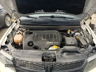 2015 Dodge Journey Crossroad with VIN 3C4PDDGG6FT601017, listed as a Copart auction lot 55485625 with 102,698 mi miles and Salvage title. Bid and sale history available at DreamBid. Image 12.