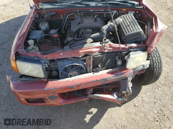 1999 Isuzu Rodeo S with VIN 4S2CM58WXX4318576, listed as a Copart auction lot 44378265 with 258,981 mi miles and Salvage Title. Bid and sale history available at DreamBid. Image 12.