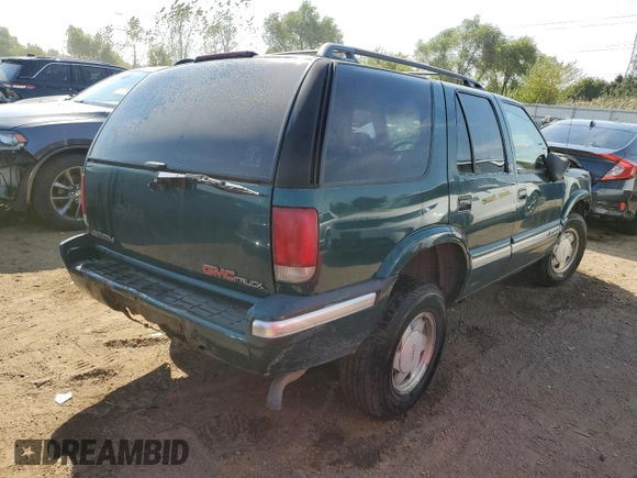 1996 GMC Jimmy SL with VIN 1GKCS13W0T2553905, listed as a Copart auction lot 71007674 with 169,513 mi miles and Salvage Title. Bid and sale history available at carsss.com. Image 3.