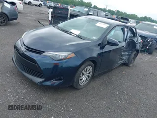 2018 Toyota Corolla L with VIN 2T1BURHEXJC003674, listed as a IAAI auction lot 42511551 with 184,697 mi miles and . Bid and sale history available at DreamBid. Image 17.