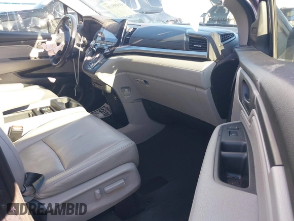2020 Honda Odyssey Touring with VIN 5FNRL6H89LB015744, listed as a IAAI auction lot 41495735 with 106,440 mi miles and . Bid and sale history available at DreamBid. Image 5.