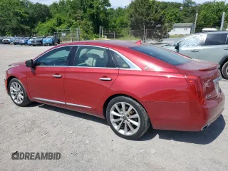2014 Cadillac XTS Luxury z VIN 2G61M5S31E9154939, wystawiony jako Copart lot #57634995 z przebiegiem 89 120 mil mil oraz Szkoda całkowita • Salvage title. Historia ofert i sprzedaży dostępna na DreamBid. Obrazek 2.